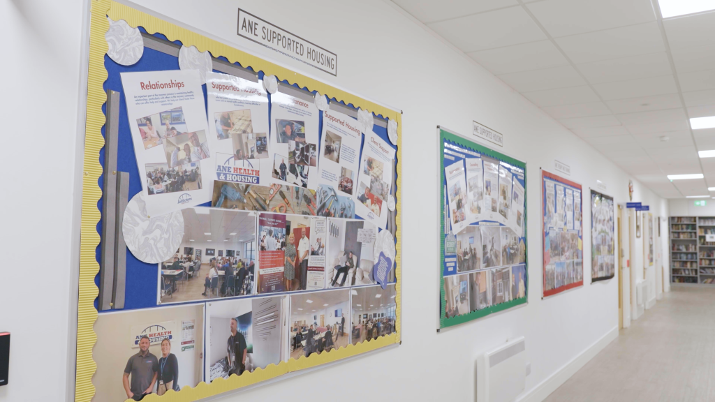 Display boards with images showcasing the different areas of the organisation